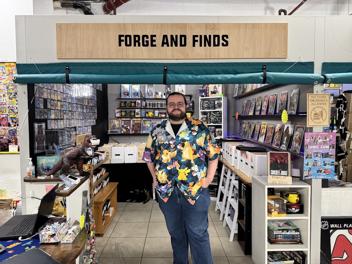 Harry, the proud owner of Forge & Finds inside Ipswich's Microshops on Carr Street